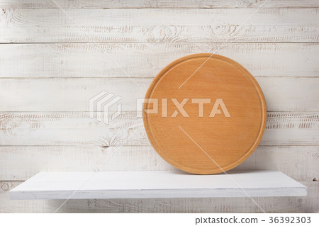 pizza cutting board at wooden shelf pizza cutting board at wooden shelf 36392303