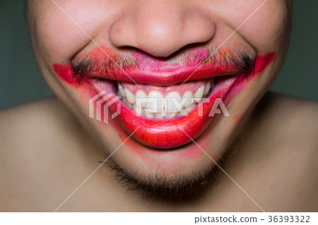 Mouth stained the color of lipstick. Mouth stained the color of lipstick. 36393322