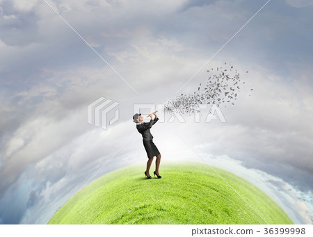 Woman play flute 36399998