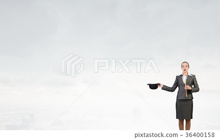 Woman magician with bowler hat Woman magician with bowler hat 36400158