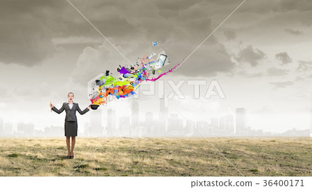 Woman magician with bowler hat 36400171