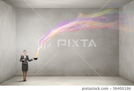 Woman magician with bowler hat 36400186