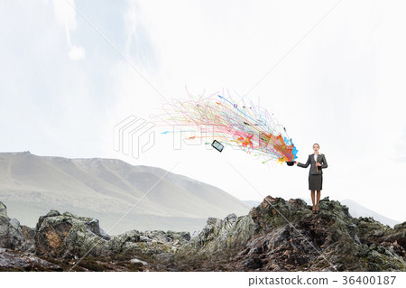 Woman magician with bowler hat 36400187