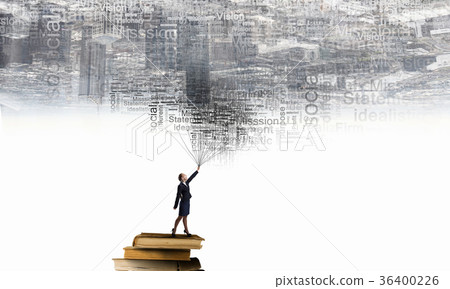 Woman on top of book stack Woman on top of book stack 36400226