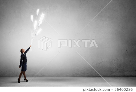 Woman with bulb balloon 36400286