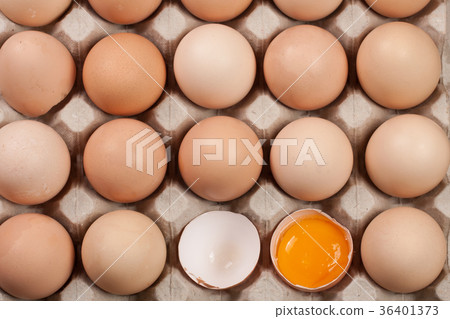 Eggs in the tray as a background. Top view Eggs in the tray as a background. Top view 36401373