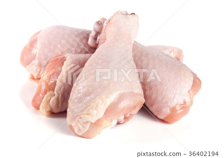 four raw chicken drumsticks isolated on white four raw chicken drumsticks isolated on white 36402194