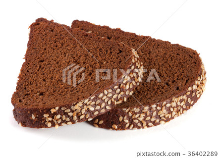 Two slices of black bread with sesame seeds Two slices of black bread with sesame seeds 36402289