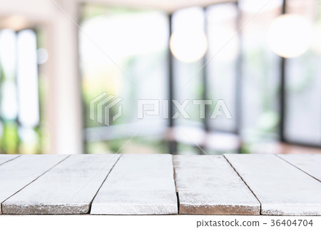 Empty wooden table and blurred background of abstract in front o 36404704
