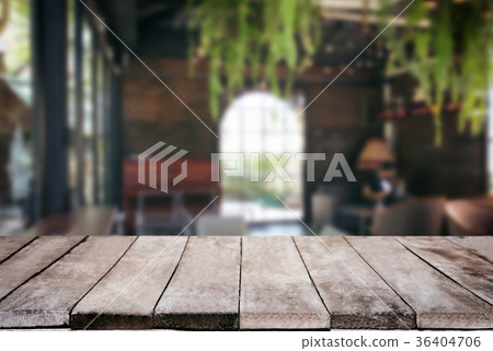 Empty wooden table and blurred background of abstract in front o Empty wooden table and blurred background of abstract in front o 36404706