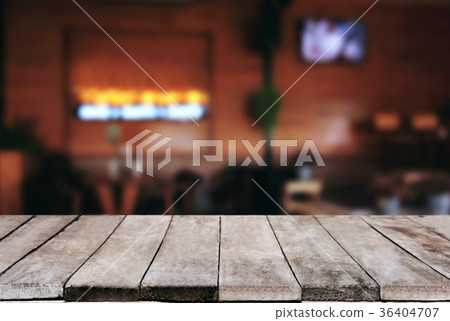 Empty wooden table and blurred background of abstract in front o 36404707