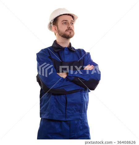 worker in a protective helmet and blue uniform 36408626