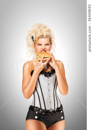 Eating burger. 36409693