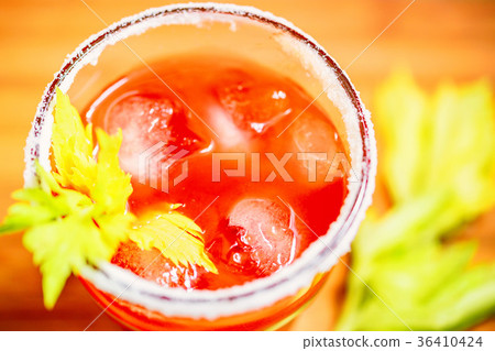 Bloody Mary alcoholic drink with lemon and celery Bloody Mary alcoholic drink with lemon and celery 36410424