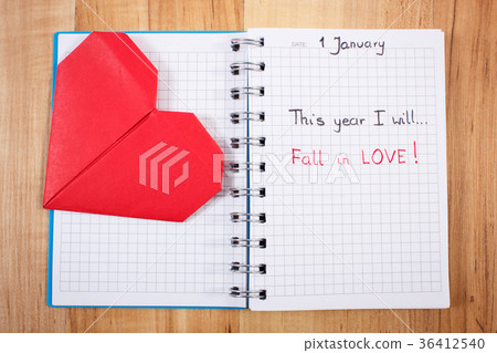 New years resolutions written in notebook 36412540