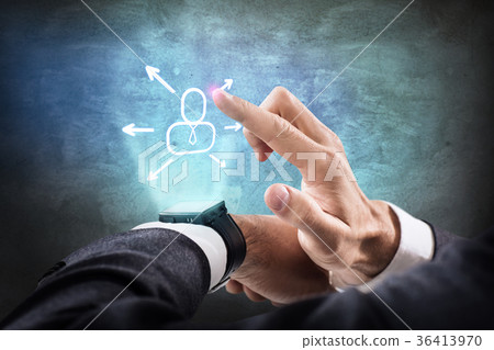 Businessman pressing virtual icons Businessman pressing virtual icons 36413970