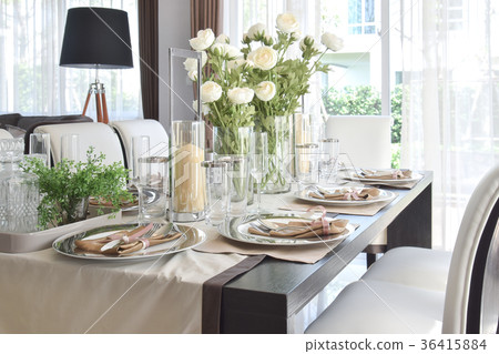 elegant table set in vintage style dining room 36415884