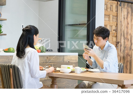 Meals discontented while watching smart husband couple cheerful eating meal food feeling 36417096