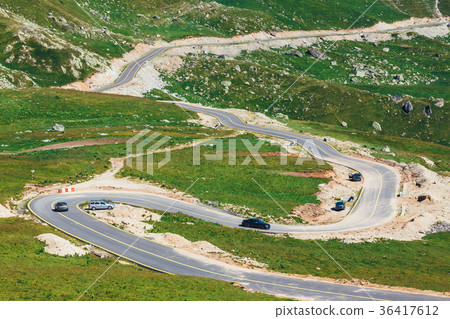 winding and dangerous road in Parang Mountains winding and dangerous road in Parang Mountains 36417612