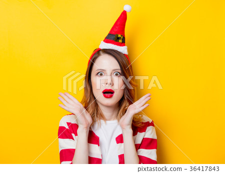 Portrait of young surprised redhead woman  36417843