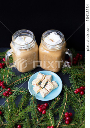 Candies and cocoa with marshmallows on a black 36418284