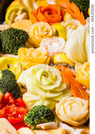Carved vegetables for baking 36420806