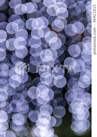 Blurred lights on a dark bokeh background. 36421815