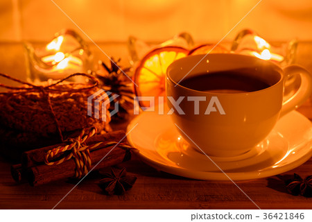 Cozy still life with tea, candle light and cookies 36421846