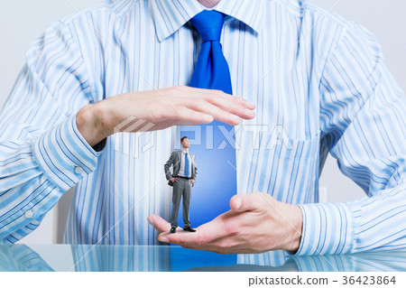Businessman covered with palms Businessman covered with palms 36423864
