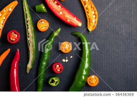 Colorful mix of chili pappers on black background. Colorful mix of chili pappers on black background. 36436369