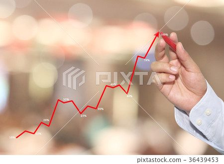 hand of Businessman touch line graph. 36439453