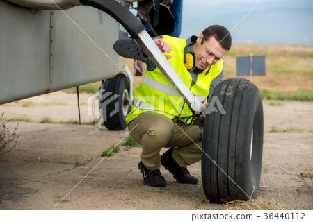 Checking aircraft's tire 36440112