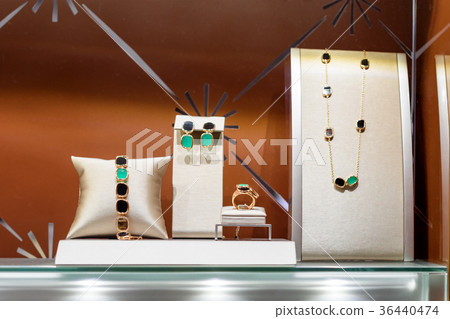 Variety of jewelry in store window. Rings Variety of jewelry in store window. Rings 36440474