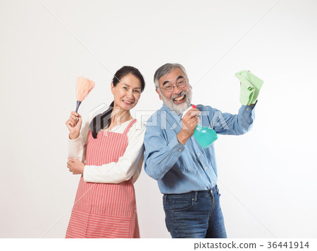 Senior couple with cleaning tools Senior couple with cleaning tools 36441914