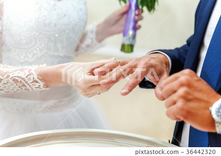 the bride wears a ring to the groom the bride wears a ring to the groom 36442320
