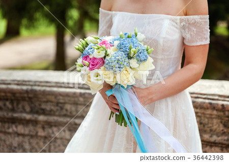 Details of the bride dresses and bridal bouquet 36442398