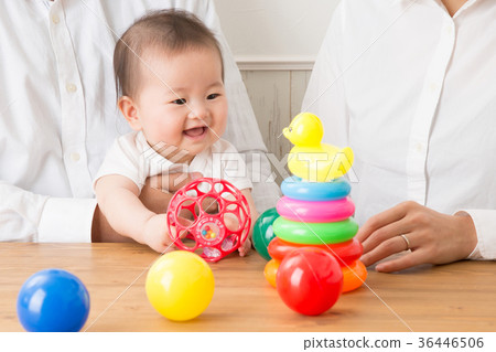 Baby playing with toys (smiles) 36446506