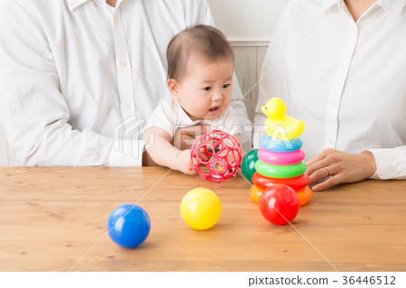 Baby playing with toys (true face) Baby playing with toys (true face) 36446512