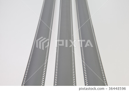 The unrolled exposed 35mm film strips  36448596