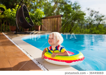 Baby in swimming pool. Kids swim. Child summer fun Baby in swimming pool. Kids swim. Child summer fun 36449069