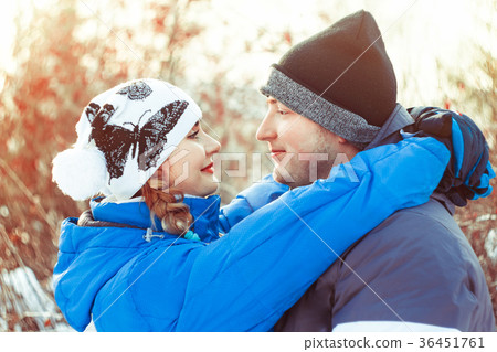 couple hugging in winter 36451761