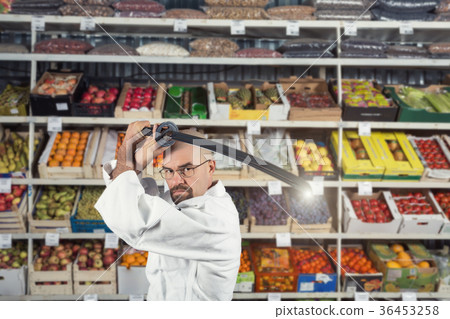 A man against the background with racks with A man against the background with racks with 36453258