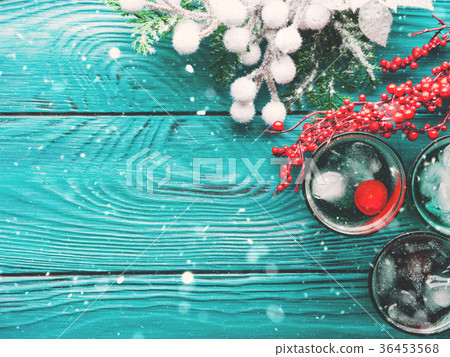 Christmas party green drink with ice and cherry 36453568