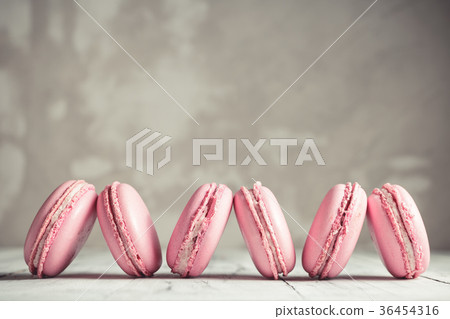 Row of Raspberry pastel pink Macarons or Macaroons Row of Raspberry pastel pink Macarons or Macaroons 36454316