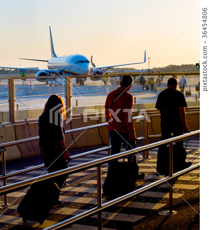 Boarding plane at airport Boarding plane at airport 36454806
