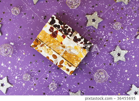 Traditional italian festive torrone or nougat. 36455695