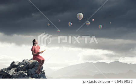 Girl in dress read book 36459025
