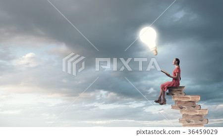 Woman in dress with book 36459029