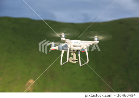 drone with the camera flying in the sky drone with the camera flying in the sky 36460484