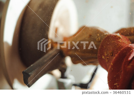 master working on a lathe on wood acceleration 36460531